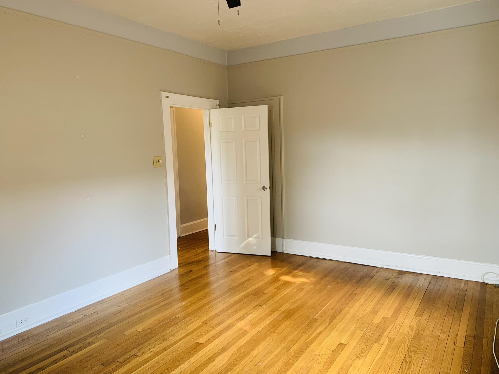 86 West 34th Street, Unit 2 Bayonne, NJ 07002 - Photo 11 of 14 an empty room with wooden floor