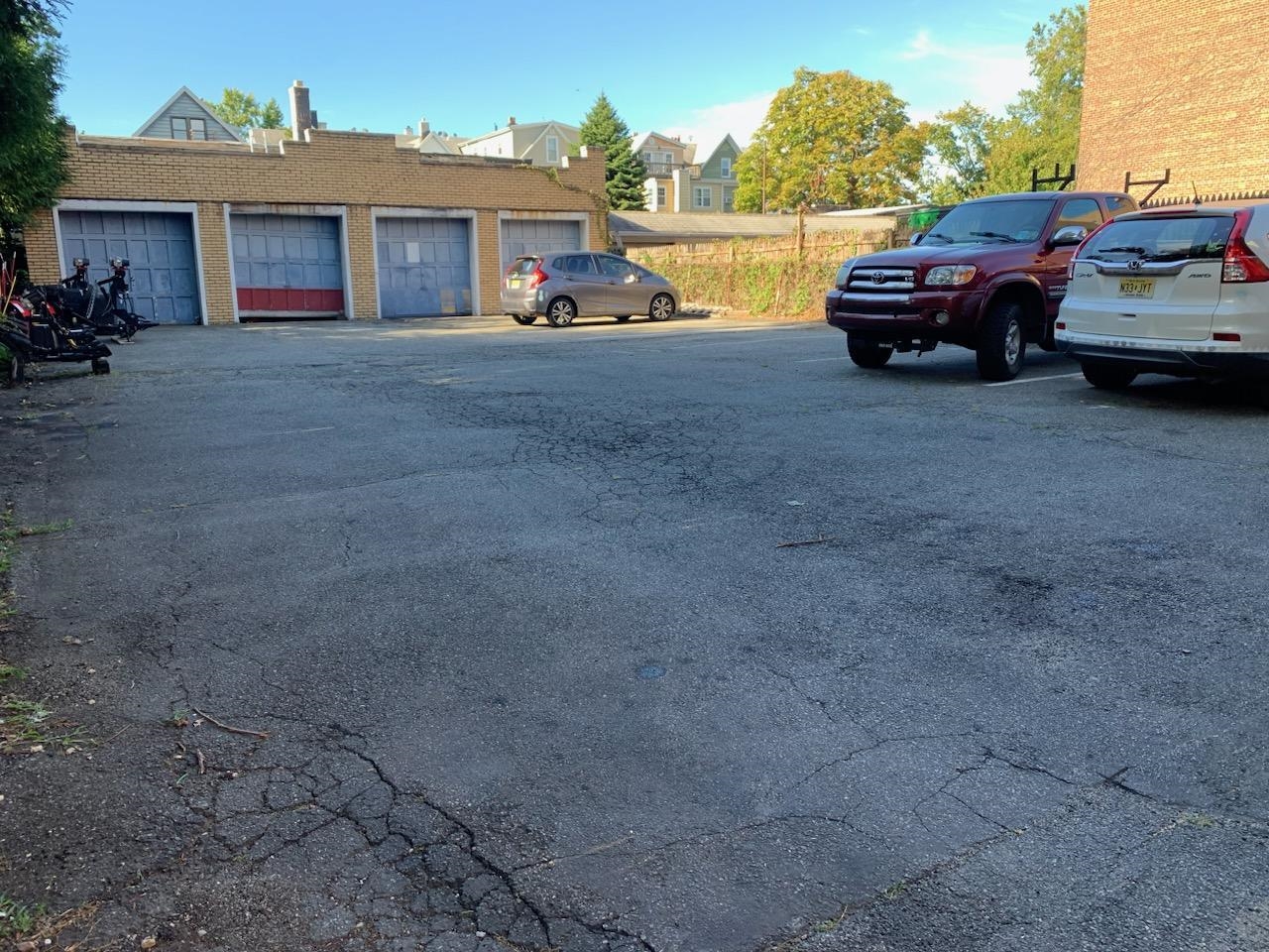 86 West 34th Street, Unit 2 Bayonne, NJ 07002 - Photo 14 of 14 a view of a car parked in front of a house
