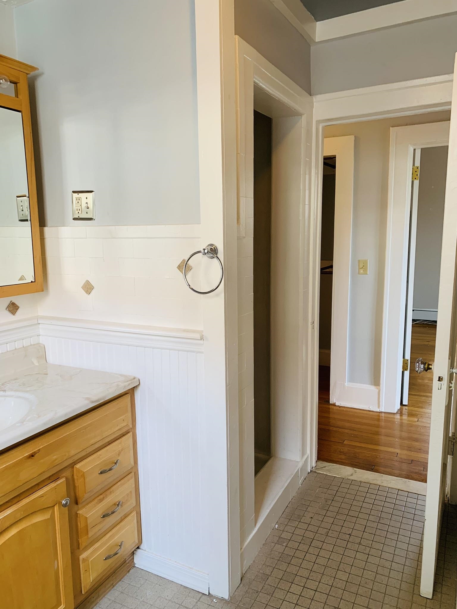 86 West 34th Street, Unit 2 Bayonne, NJ 07002 - Photo 6 of 14 a view of bathroom with mirror