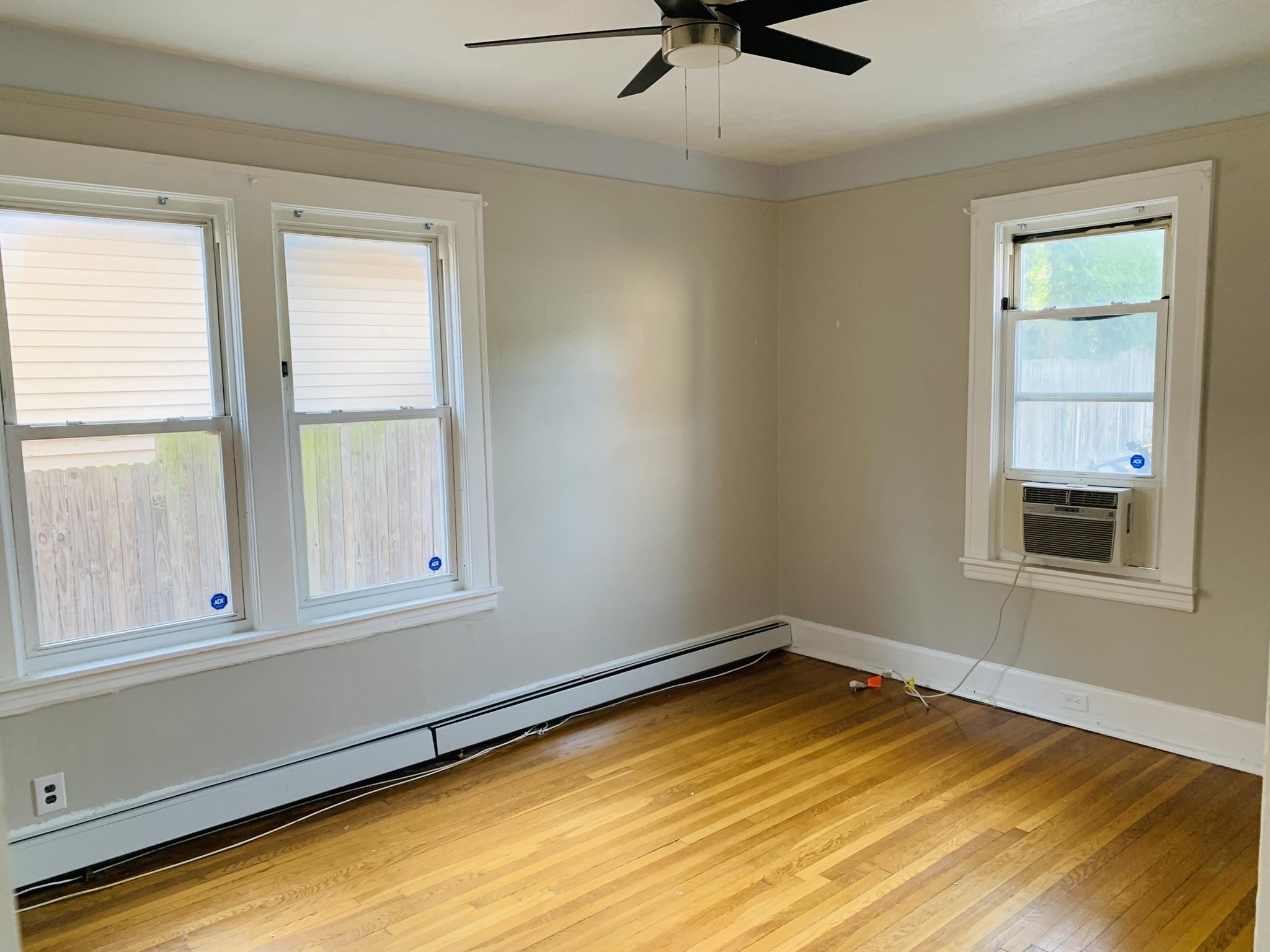 86 West 34th Street, Unit 2 Bayonne, NJ 07002 - Photo 10 of 14 an empty room with a window