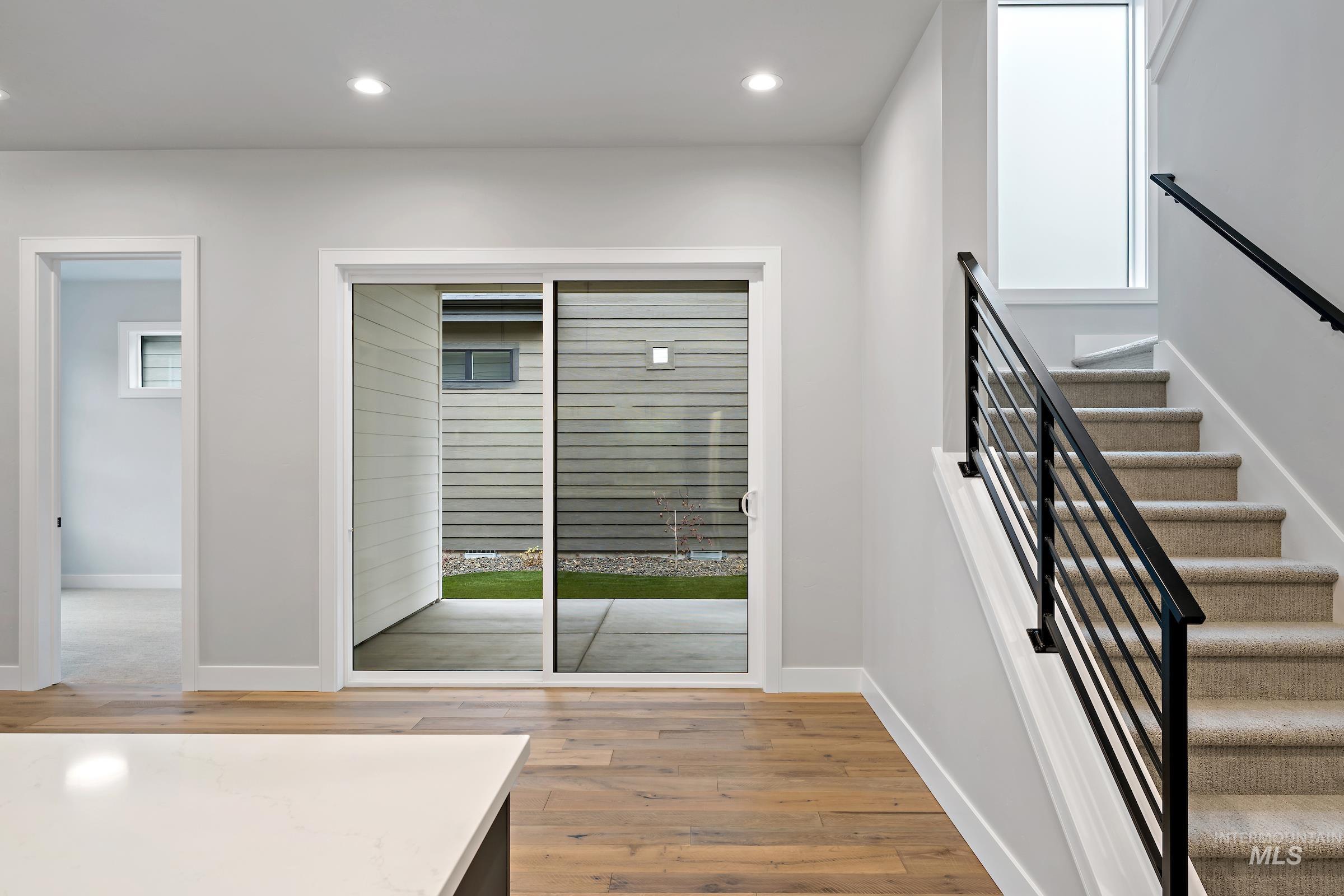 11725 North Rabbitbrush Way Boise, ID 83714 - Photo 19 of 36 Foyer with light wood-type flooring, stairway, and recessed lighting