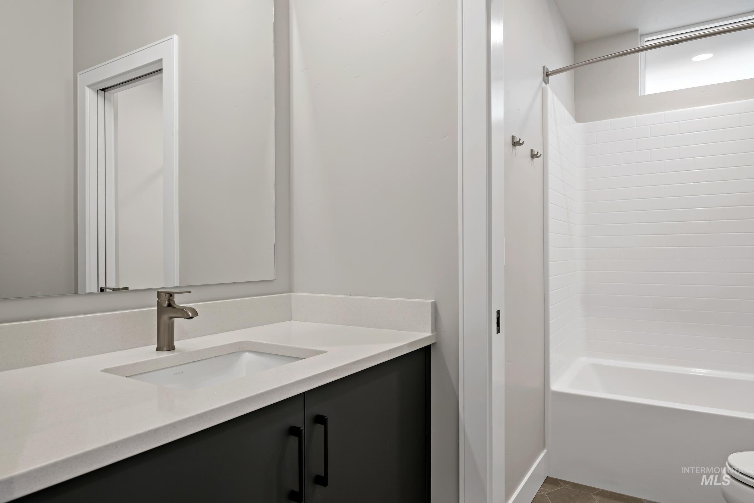 11725 North Rabbitbrush Way Boise, ID 83714 - Photo 26 of 36 Full bath with vanity and shower combination