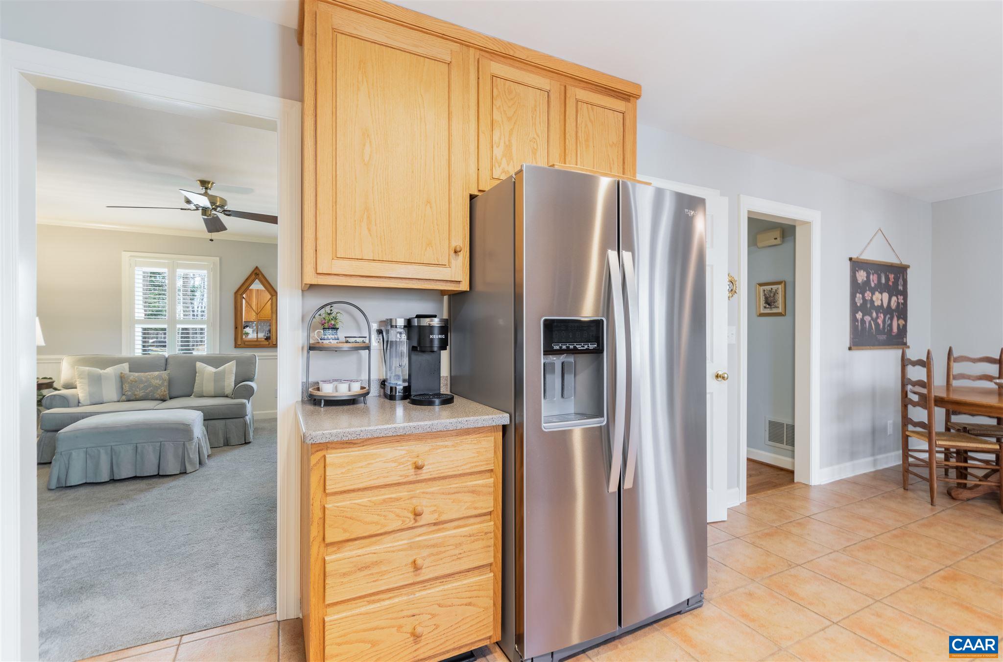 2640 Thrush Road Charlottesville, VA 22901 - Photo 11 of 42 a kitchen with stainless steel appliances granite countertop a refrigerator and cabinets