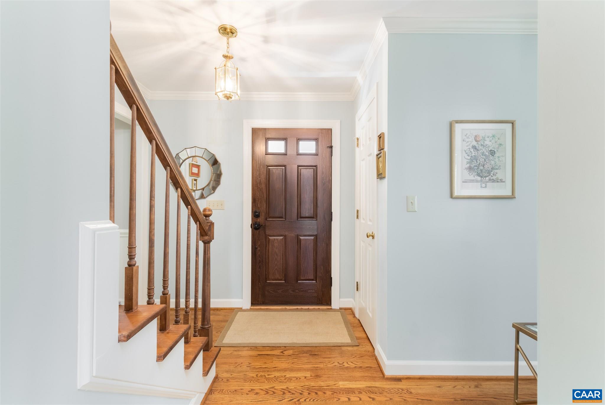 2640 Thrush Road Charlottesville, VA 22901 - Photo 16 of 42 a view of a hallway with a door and stairs