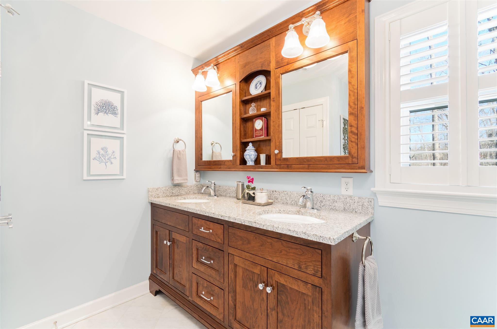 2640 Thrush Road Charlottesville, VA 22901 - Photo 21 of 42 a bathroom with a sink and a mirror