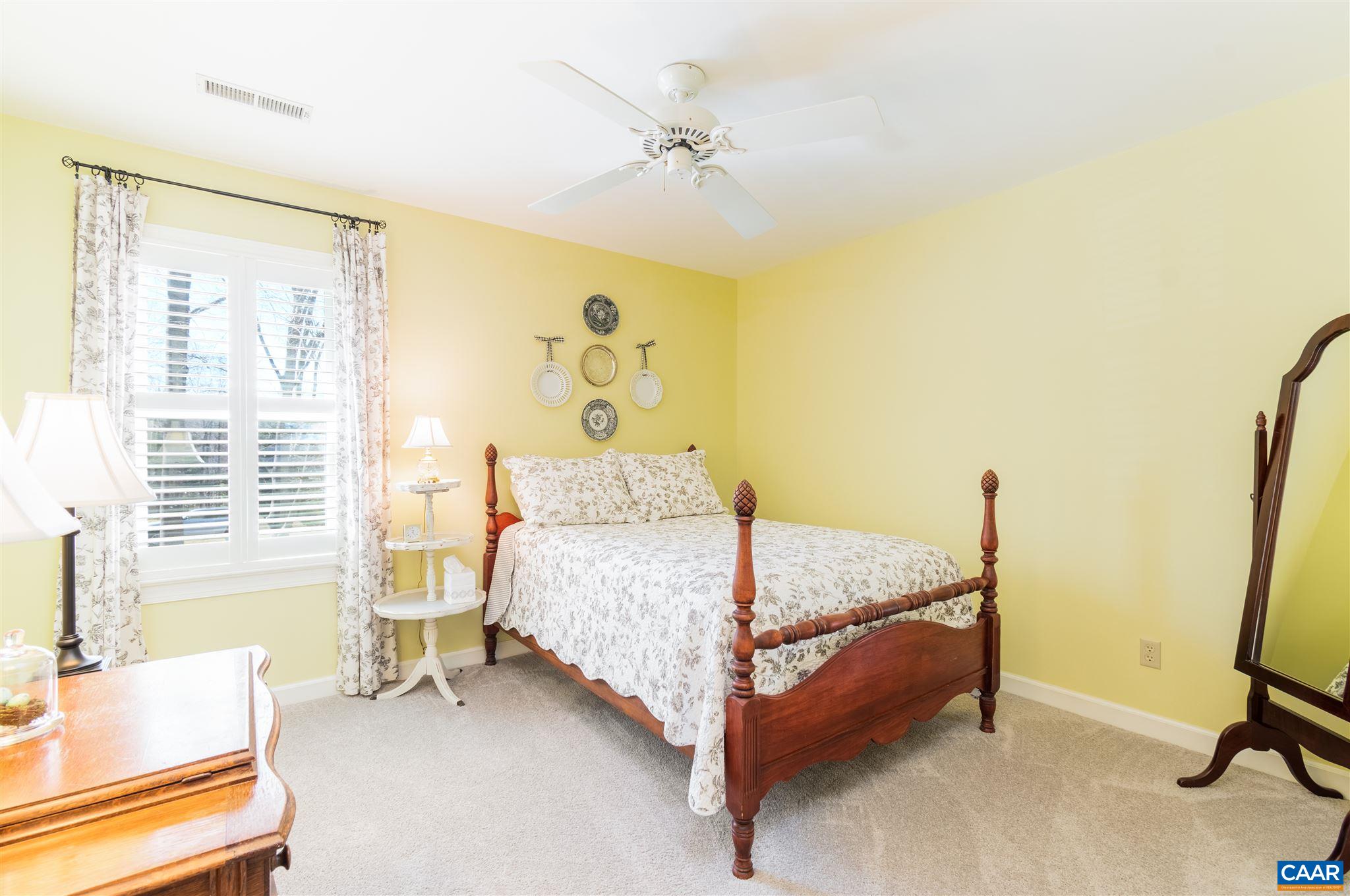 2640 Thrush Road Charlottesville, VA 22901 - Photo 25 of 42 a bedroom with a bed and a table