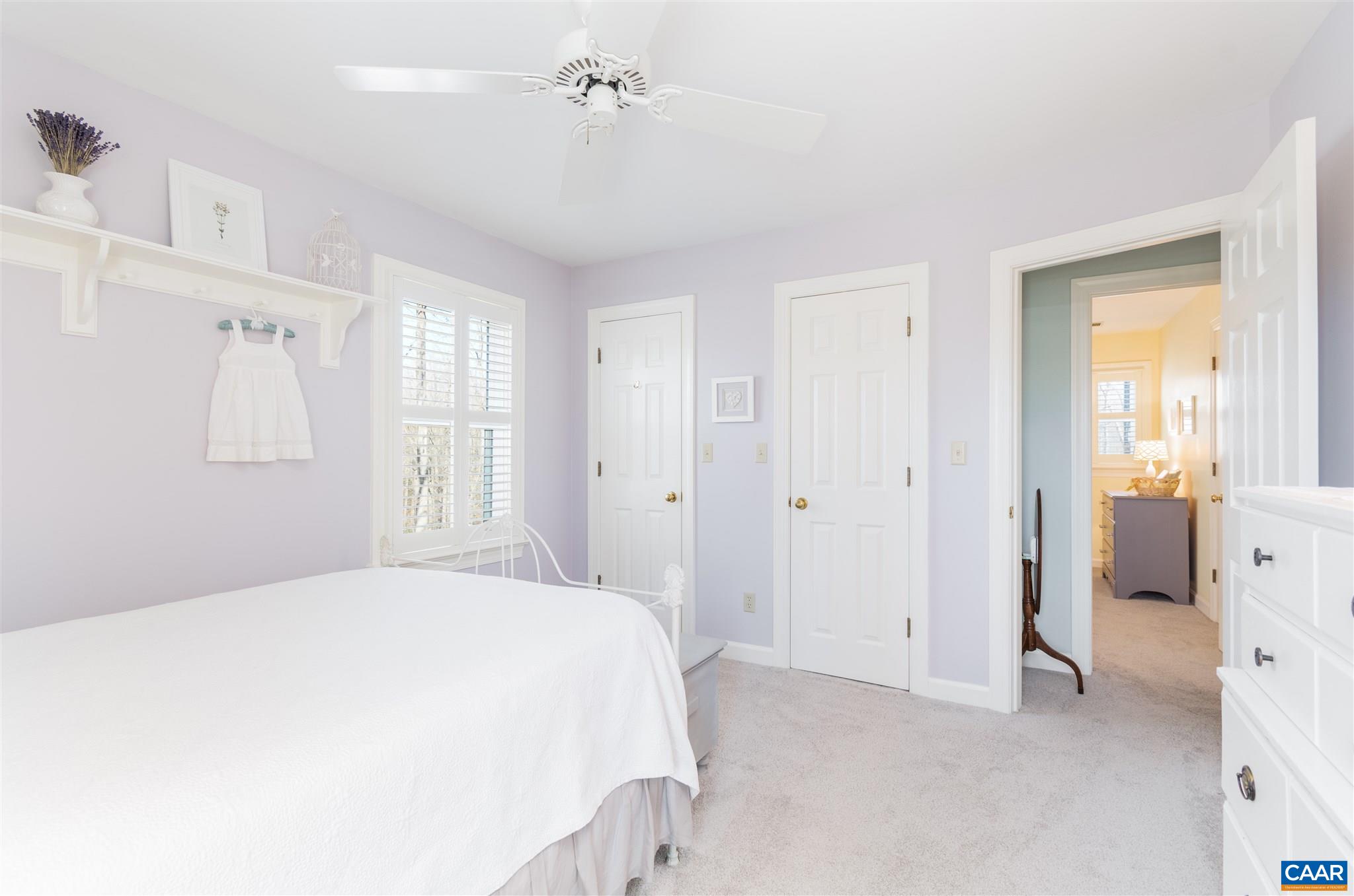 2640 Thrush Road Charlottesville, VA 22901 - Photo 31 of 42 a spacious bedroom with a bed and a window