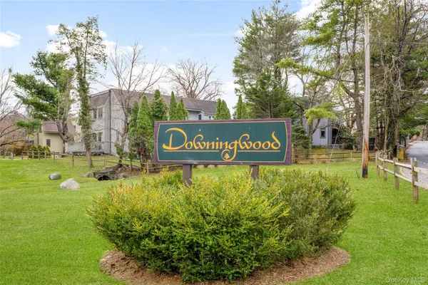 a view of outdoor space with sign board and garden