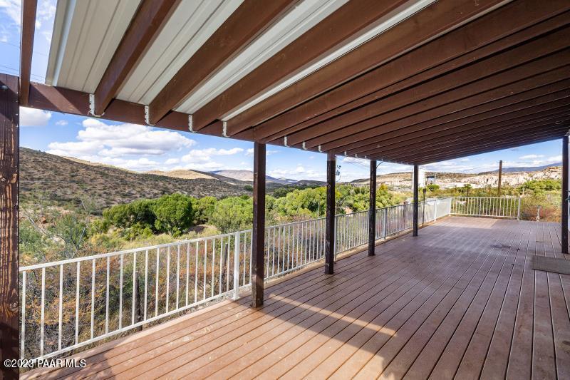 8295 Iron Springs Road Skull Valley, AZ 86338 - Photo 26 of 36 Expansive Covered Deck