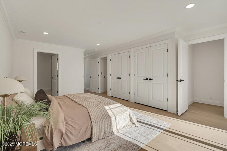 24 Surf Street Sea Bright, NJ 07760 - Photo 21 of 47 a bed room with a bed and a closet