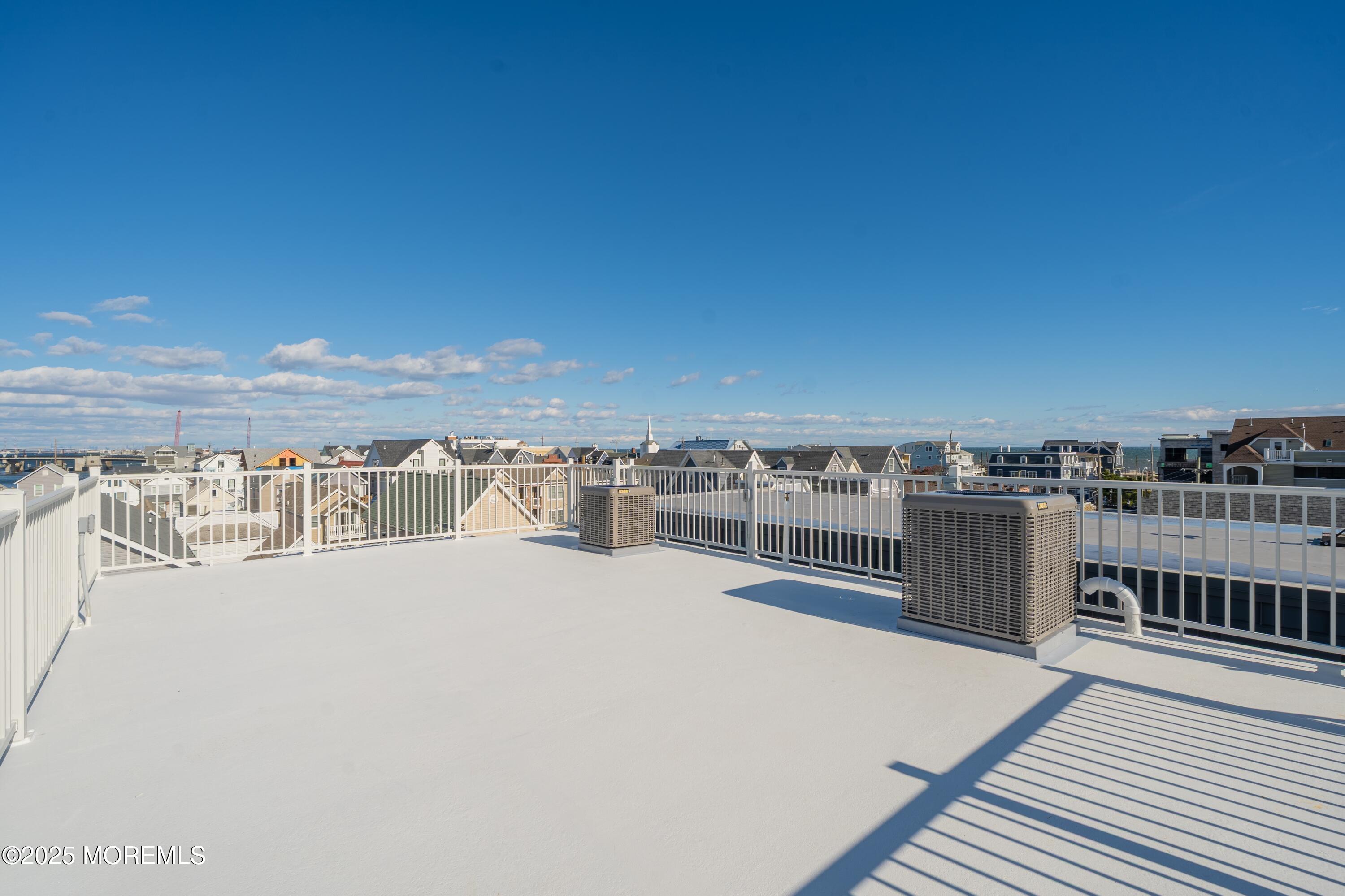 24 Surf Street Sea Bright, NJ 07760 - Photo 31 of 47 a view of a terrace with skyline