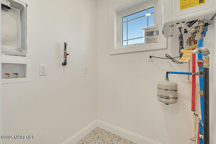 24 Surf Street Sea Bright, NJ 07760 - Photo 33 of 47 a bathroom with a shower