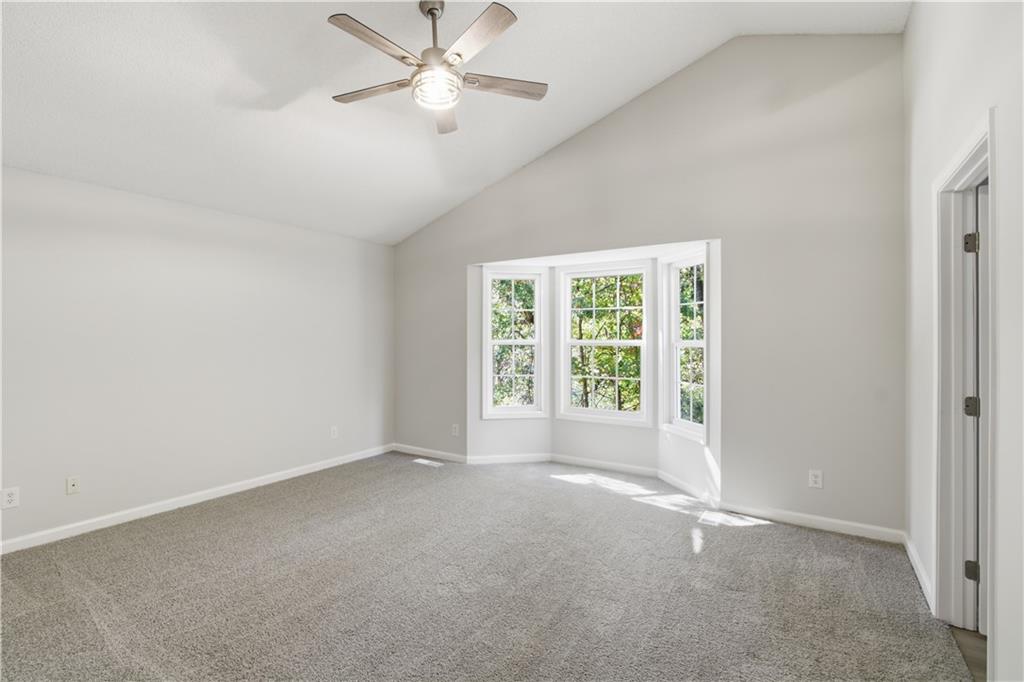 10 Mariner Way Acworth, GA 30102 - Photo 11 of 20 an empty room with a window and a fan