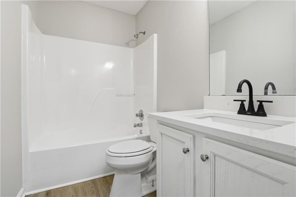 10 Mariner Way Acworth, GA 30102 - Photo 13 of 20 a bathroom with a sink a toilet and a mirror