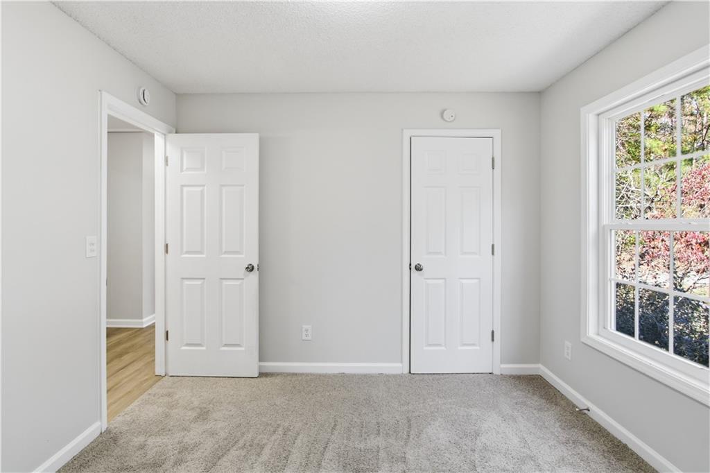 10 Mariner Way Acworth, GA 30102 - Photo 10 of 20 an empty room with windows and closet