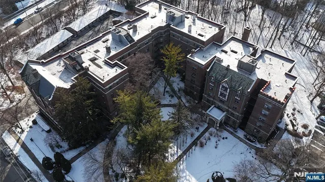 a front view of a building with glass windows