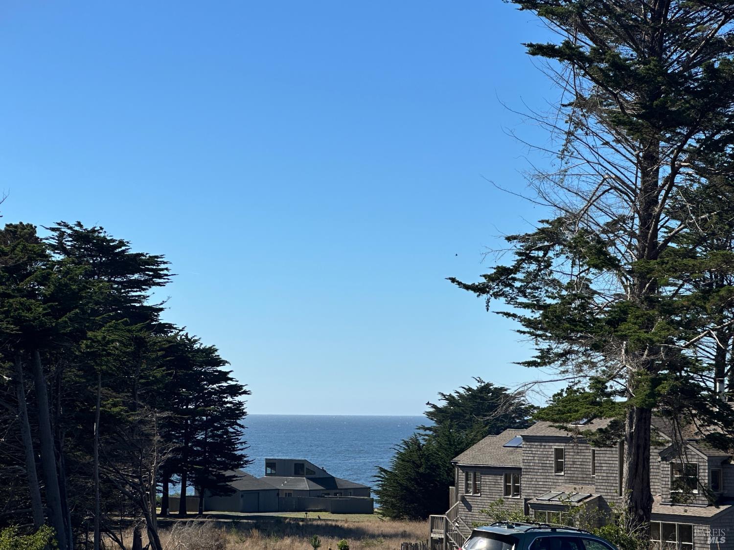 135 Shepherds Close The Sea Ranch, CA 95497 - Photo 28 of 30 a view of residential houses and car parked on the roadside