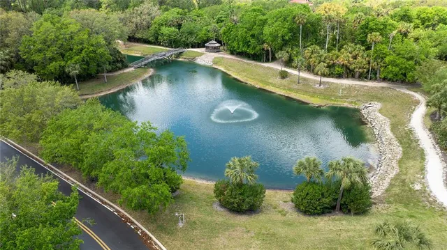 a view of a lake with a yard