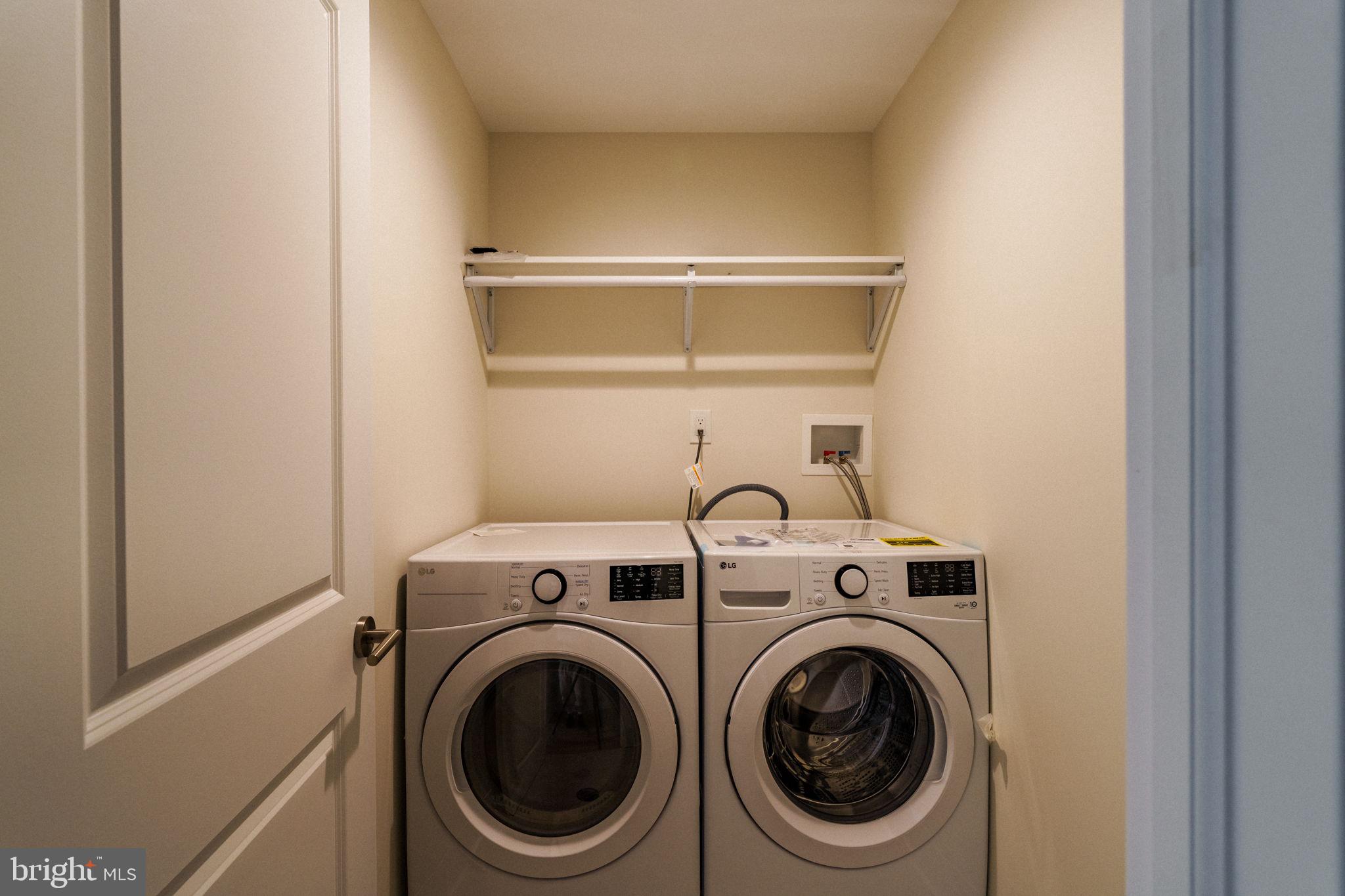 2104 Naudain Street Philadelphia, PA 19146 - Photo 19 of 56 a utility room with dryer and washer