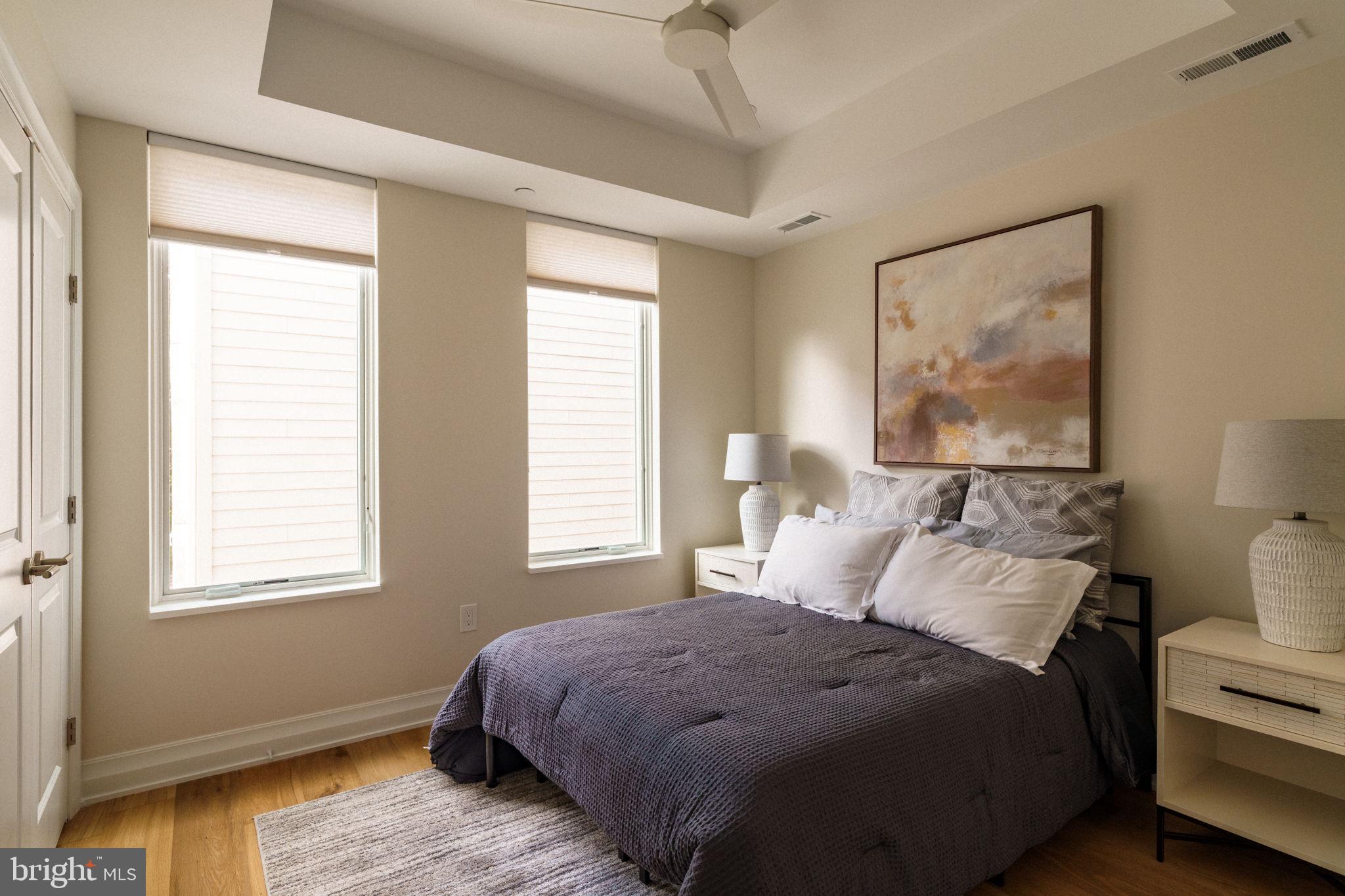 2104 Naudain Street Philadelphia, PA 19146 - Photo 21 of 56 a bedroom with a bed and a window