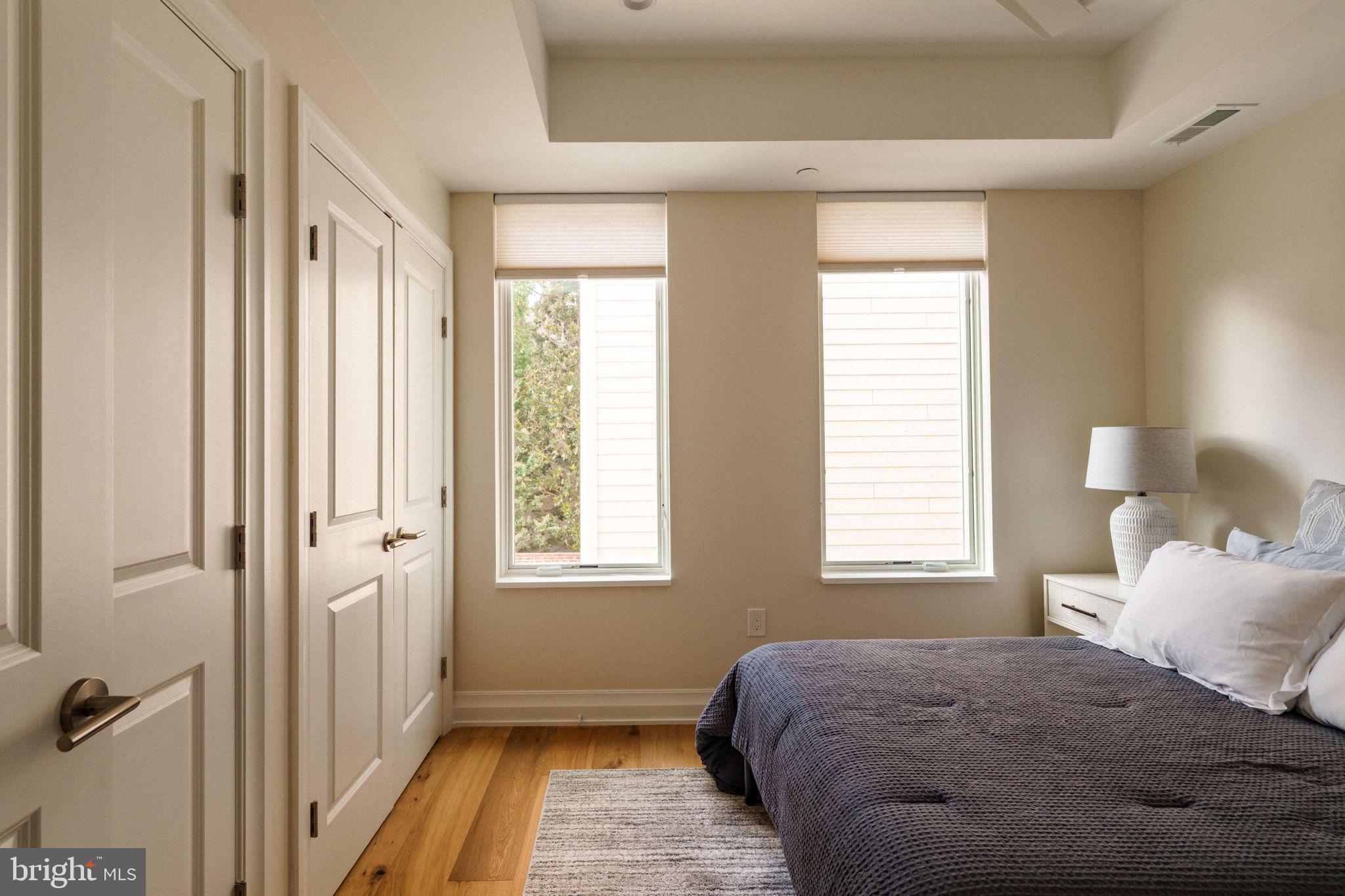 2104 Naudain Street Philadelphia, PA 19146 - Photo 22 of 56 a bedroom with a bed and a window