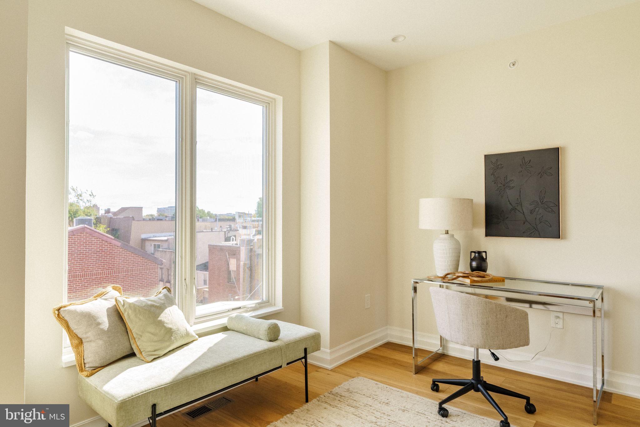 2104 Naudain Street Philadelphia, PA 19146 - Photo 33 of 56 a workspace with furniture and a window