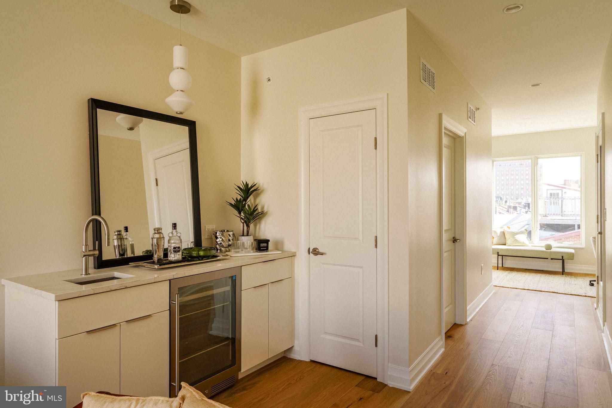 2104 Naudain Street Philadelphia, PA 19146 - Photo 34 of 56 a bathroom with a sink and a mirror