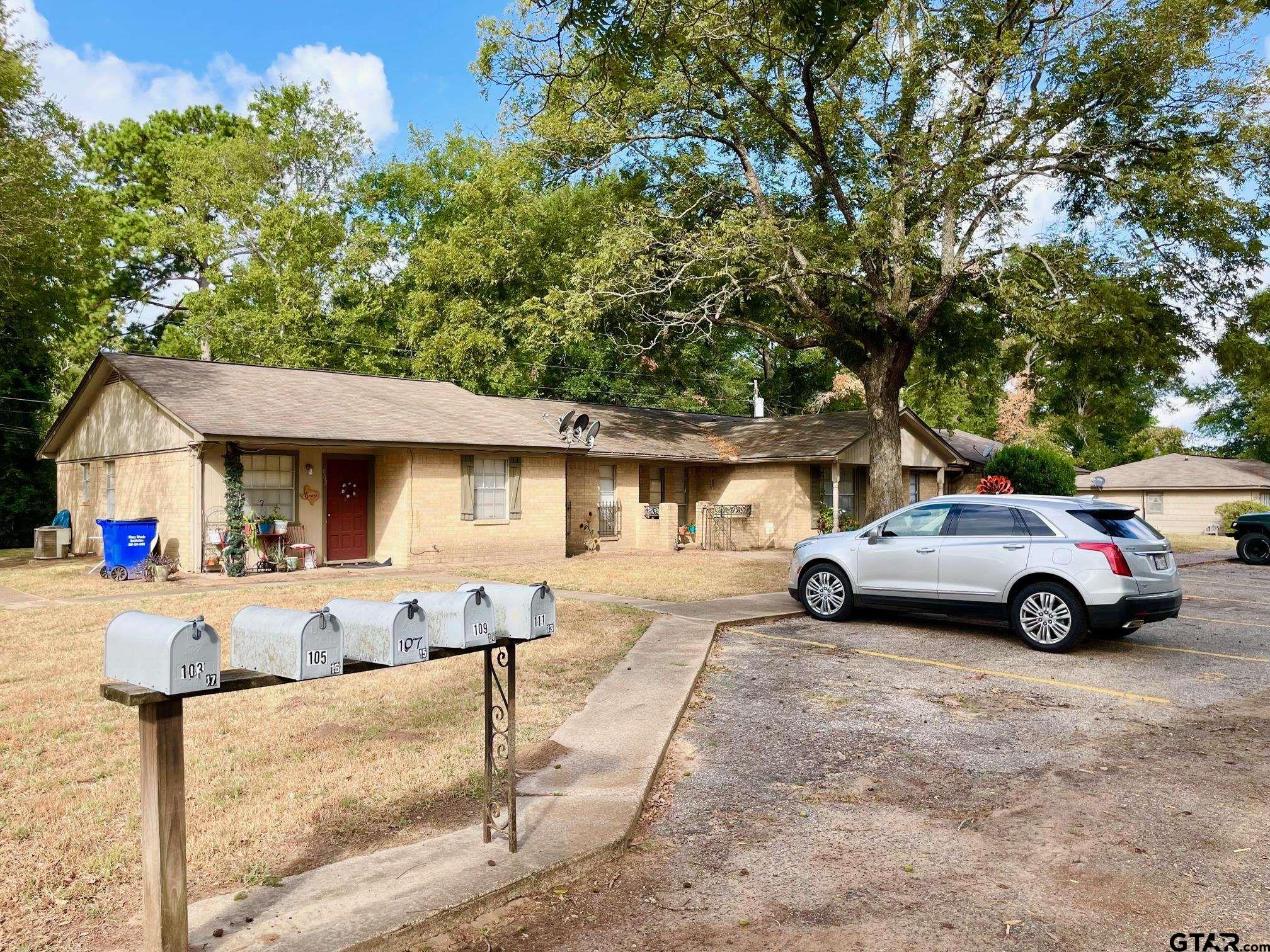 2301 North 6th Street Crockett, TX 75835 - Photo 4 of 12 a view of street with parked cars