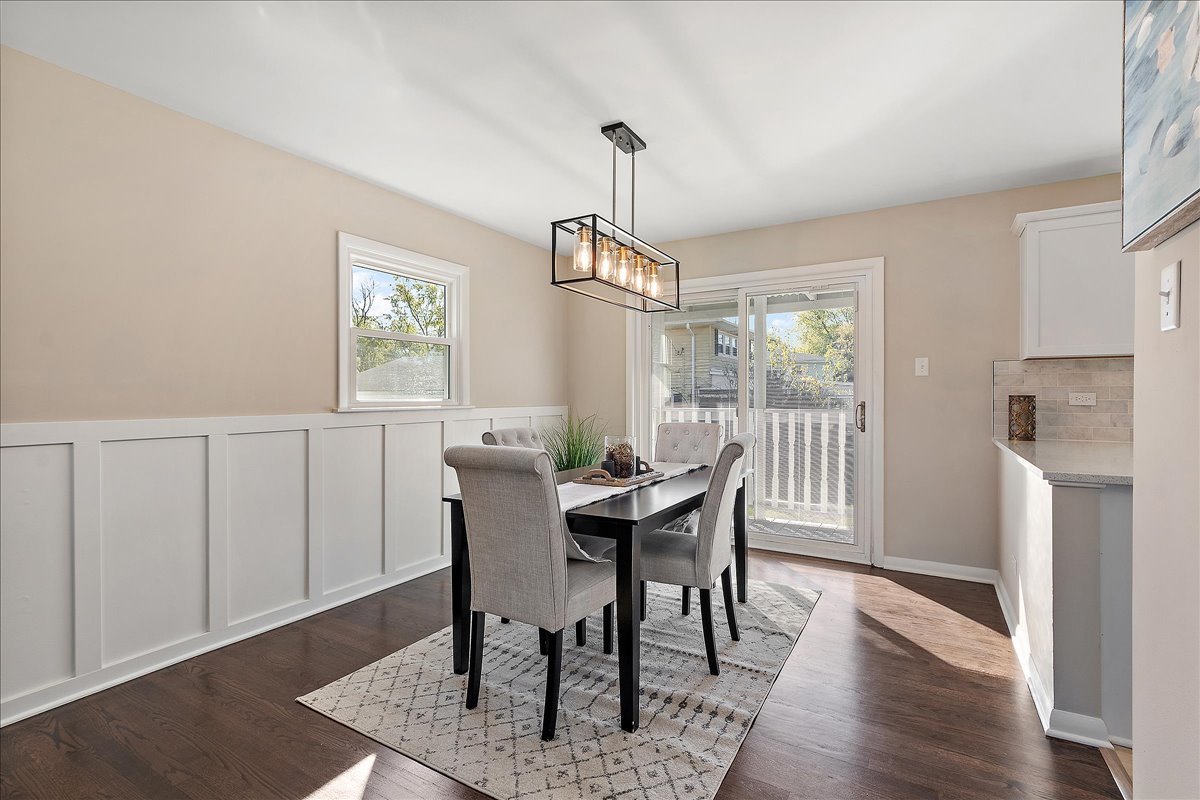 364 Division Street Crete, IL 60417 - Photo 13 of 47 a view of a dining room with furniture window and wooden floor