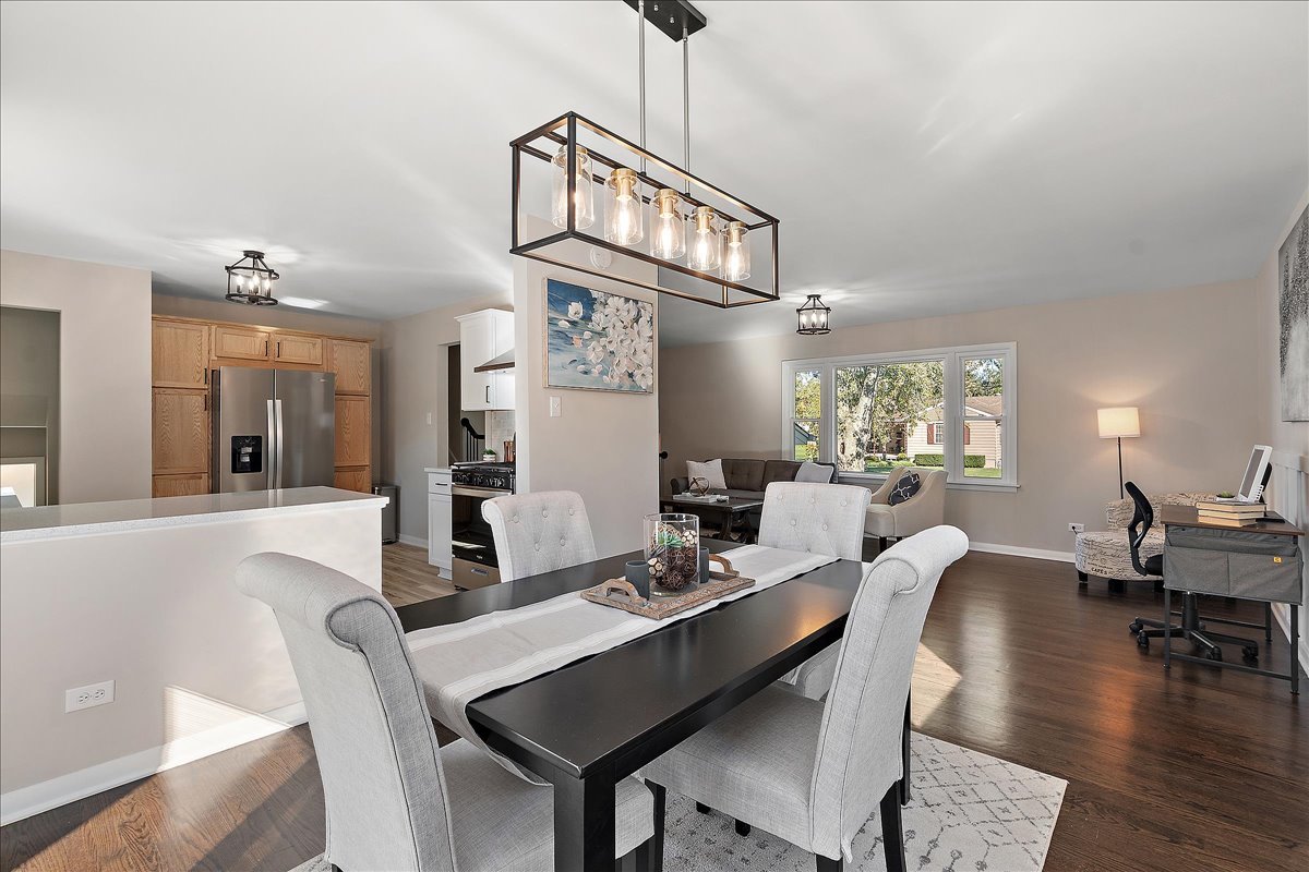 364 Division Street Crete, IL 60417 - Photo 16 of 47 a view of a dining room with furniture and wooden floor