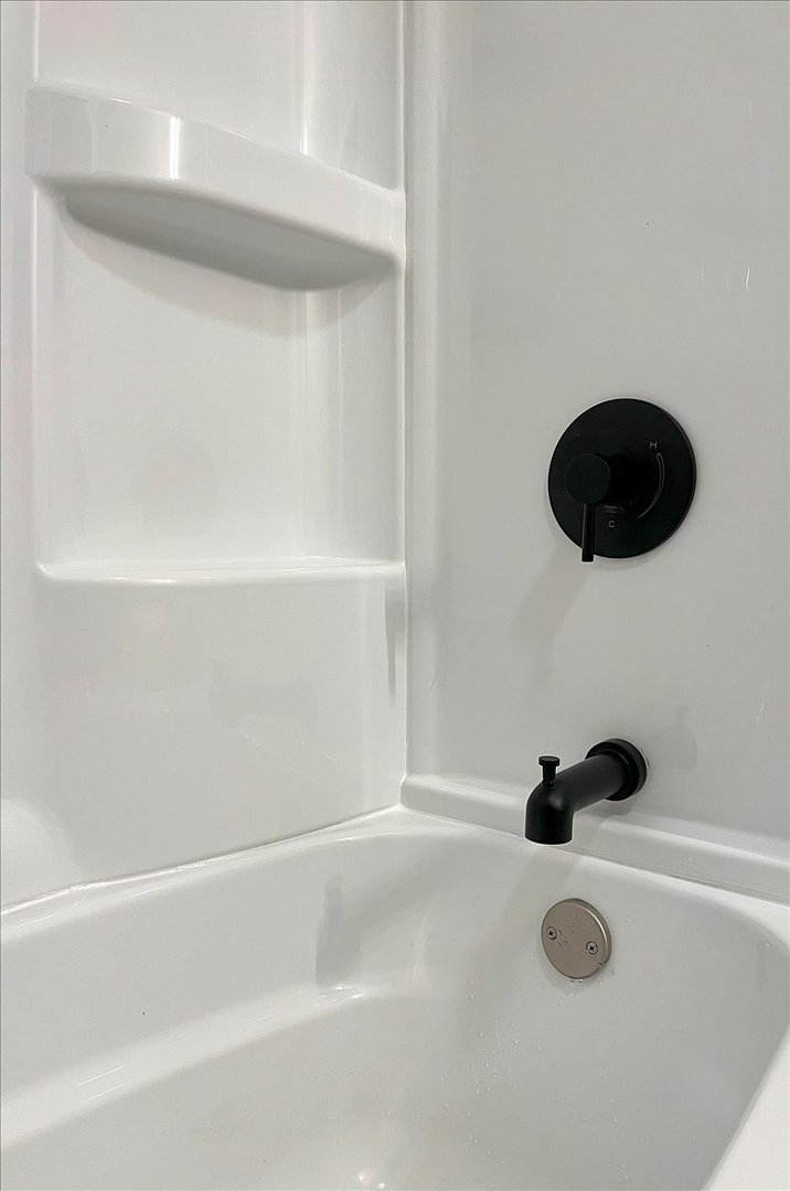 364 Division Street Crete, IL 60417 - Photo 31 of 47 a view of cabinet with a close up of a shower