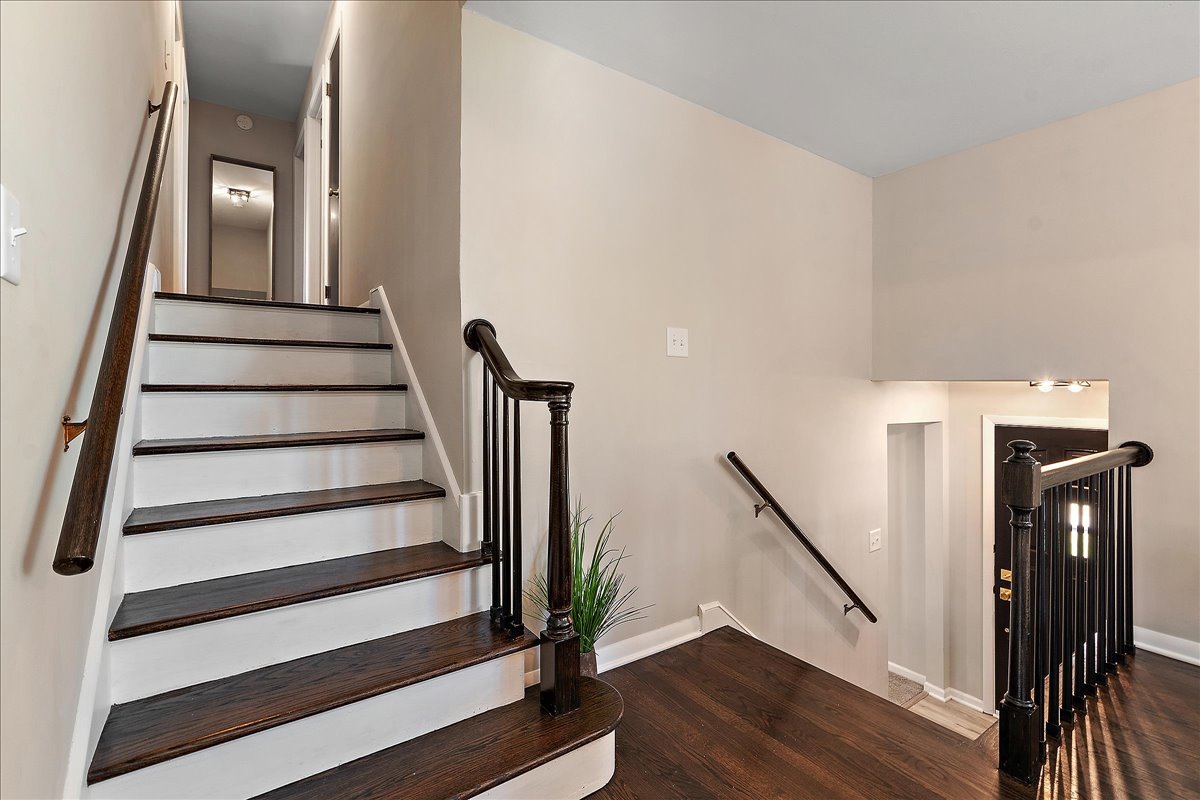 364 Division Street Crete, IL 60417 - Photo 6 of 47 a view of entryway with wooden floor and stairs