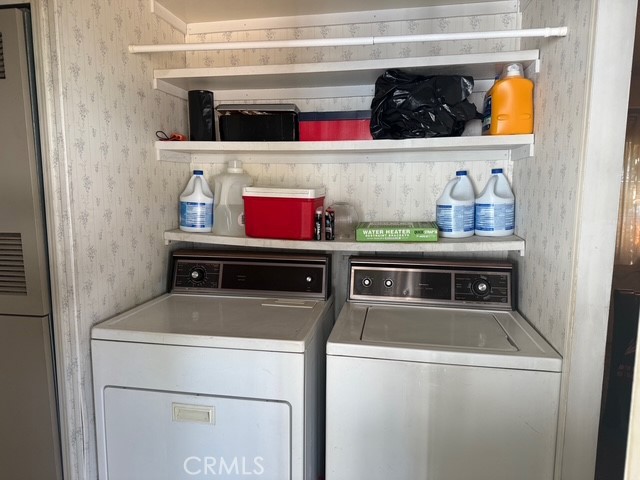 2500 North State Highway 59, Unit 270 Merced, CA 95340 - Photo 13 of 14 a utility room with dryer and washer