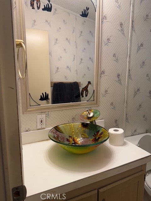 2500 North State Highway 59, Unit 270 Merced, CA 95340 - Photo 5 of 14 a bathroom with a sink and a mirror