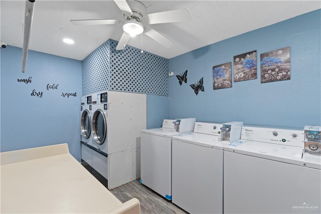 2425 Barnard Road, Unit 6C Brownsville, TX 78520 - Photo 15 of 15 Laundry room with washer and dryer, ceiling fan, and light wood-type flooring