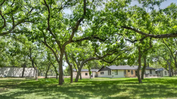 a living room with furniture and flat screen tv