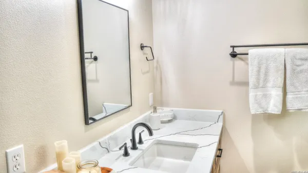 a view of a town with mountains in the background