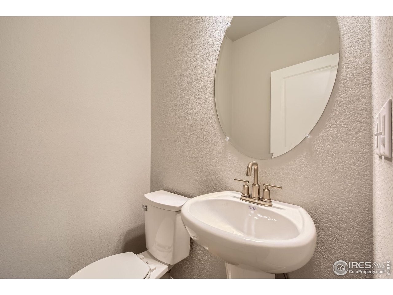 2290 Walbridge Road Fort Collins, CO 80524 - Photo 13 of 24 Half bathroom on the main level