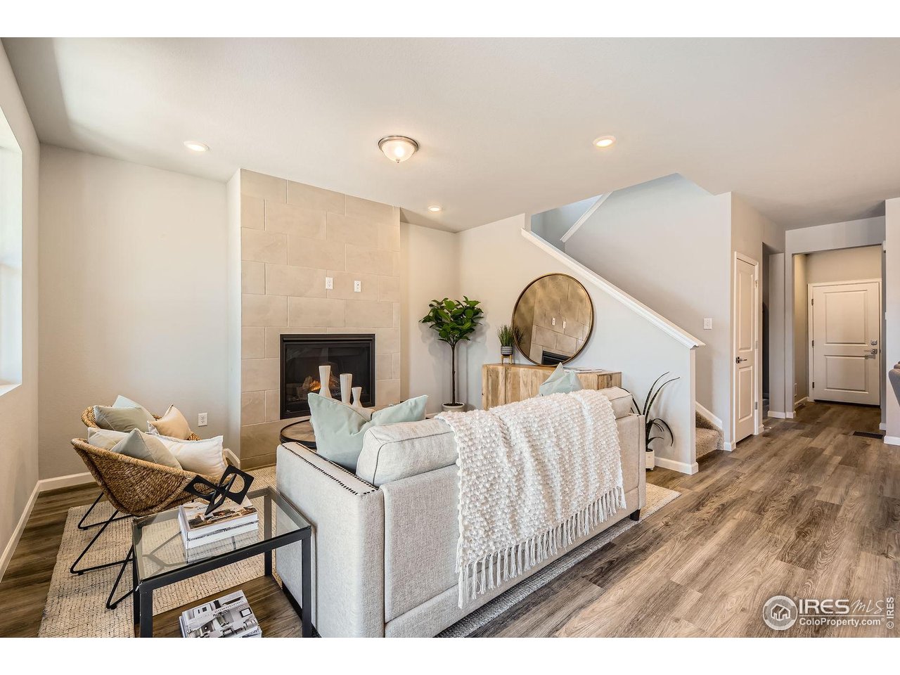 2290 Walbridge Road Fort Collins, CO 80524 - Photo 2 of 24 Cozy family room with gas fireplace
