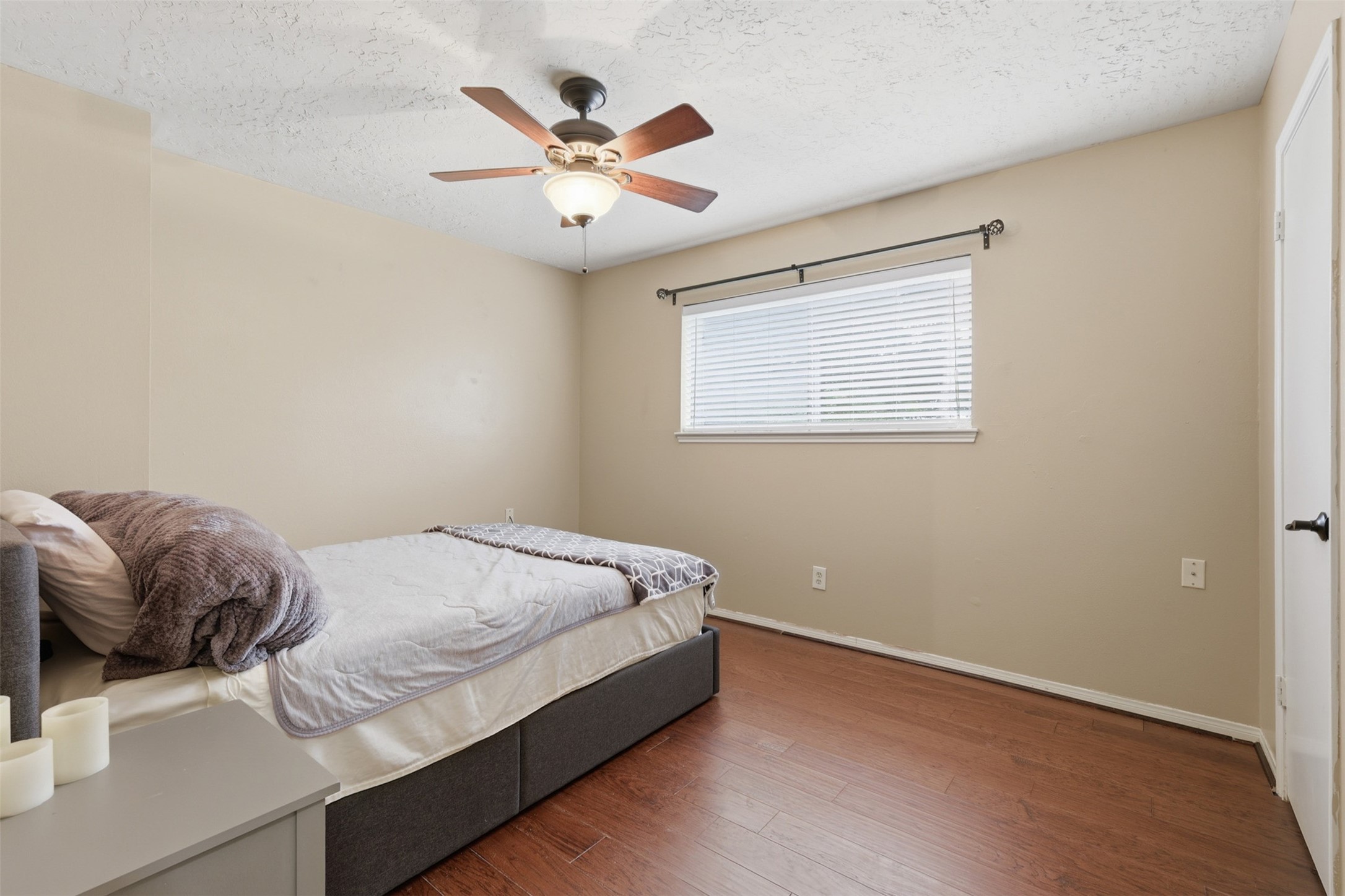 7010 River Mill Drive Spring, TX 77379 - Photo 17 of 29 a bedroom with a bed and a window