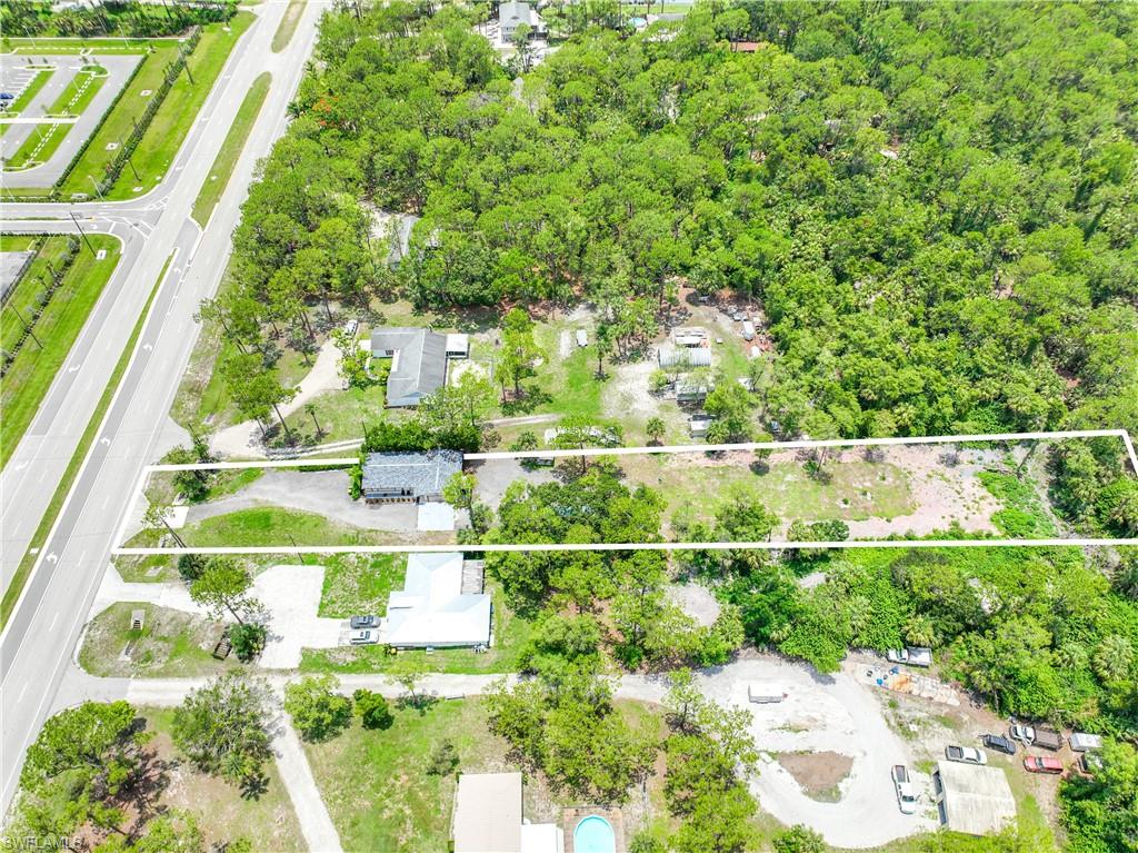 4641 Pine Ridge Road Naples, FL 34119 - Photo 27 of 30 a view of outdoor space and yard