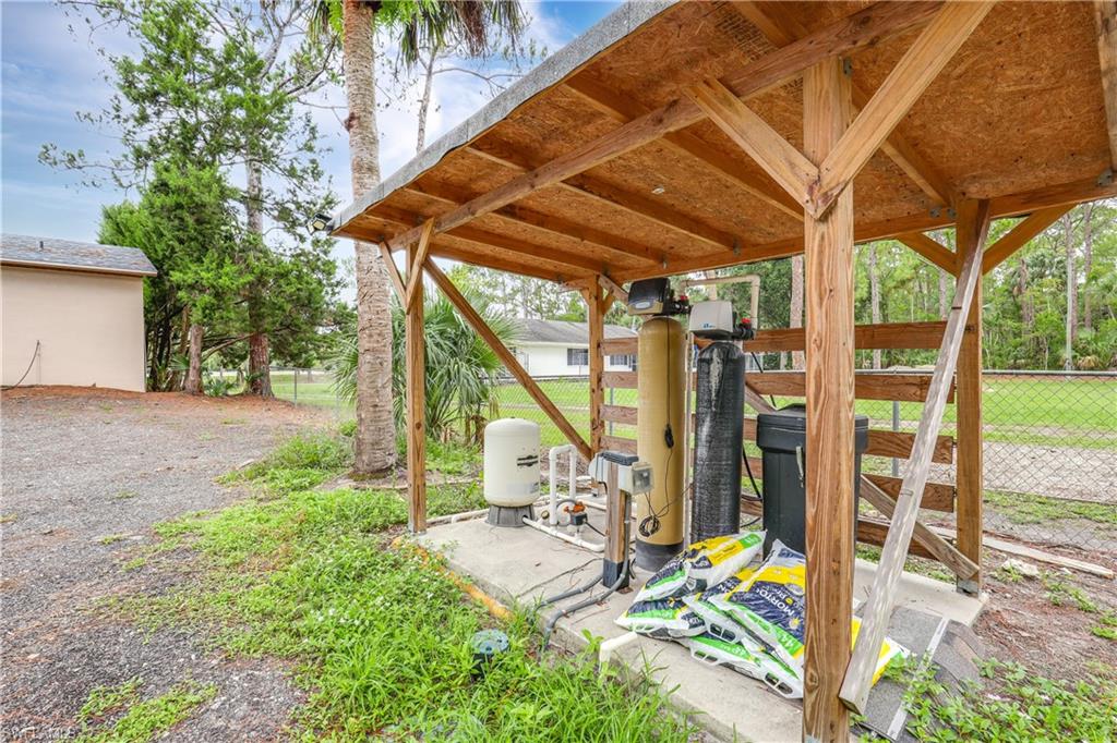 4641 Pine Ridge Road Naples, FL 34119 - Photo 29 of 30 a view of porch with seating space