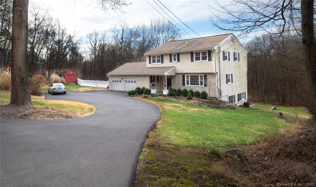 33 Rock Ridge Road Newtown, CT 06470 - Photo 1 of 1 a view of a house with backyard and sitting area