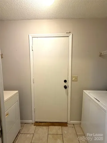 a bathroom with a shower and a toilet