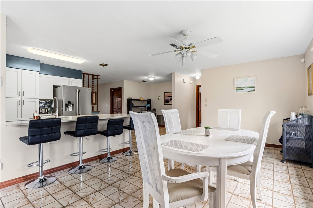 831 Clearmont Street Sebastian, FL 32958 - Photo 16 of 24 a view of a dining room with furniture