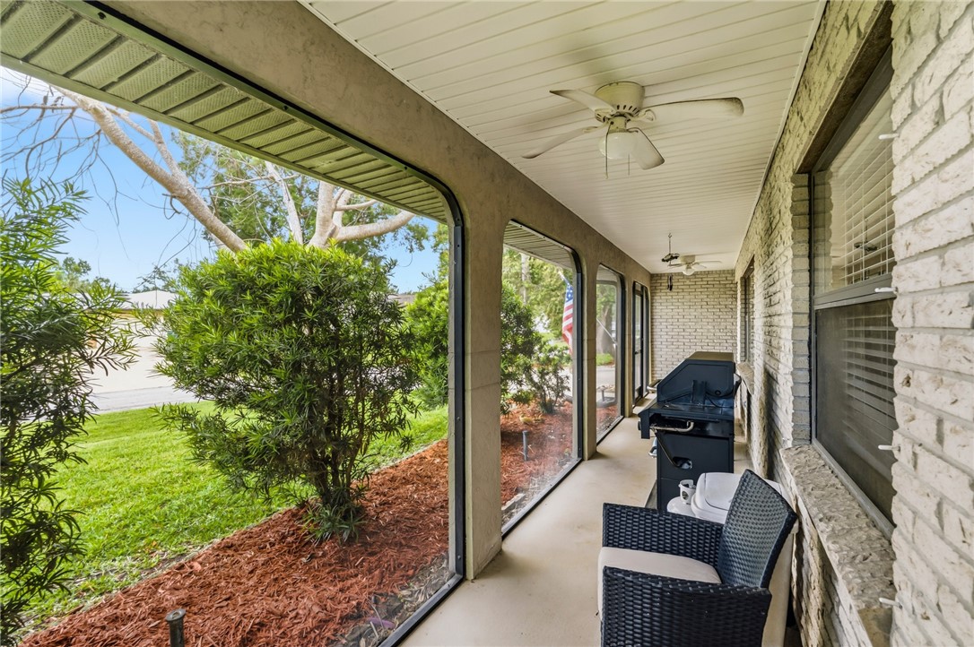 831 Clearmont Street Sebastian, FL 32958 - Photo 3 of 24 a living room with patio furniture