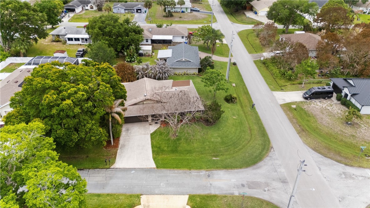 831 Clearmont Street Sebastian, FL 32958 - Photo 5 of 24 an aerial view of a swimming pool