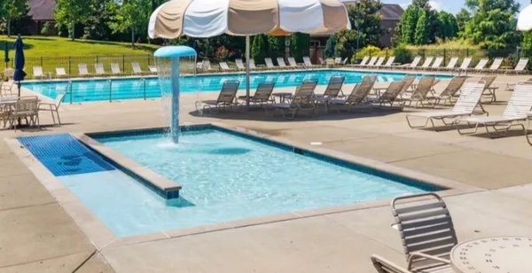 a black white wall with a large window