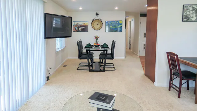 a bathroom with a tub toilet and sink