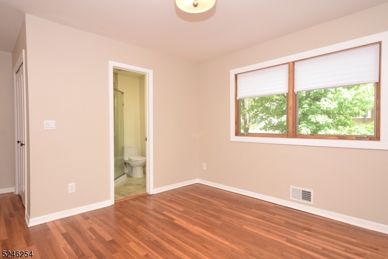 511 Scotland Road South Orange, NJ 07079 - Photo 11 of 26 a view of a room with wooden floor and window